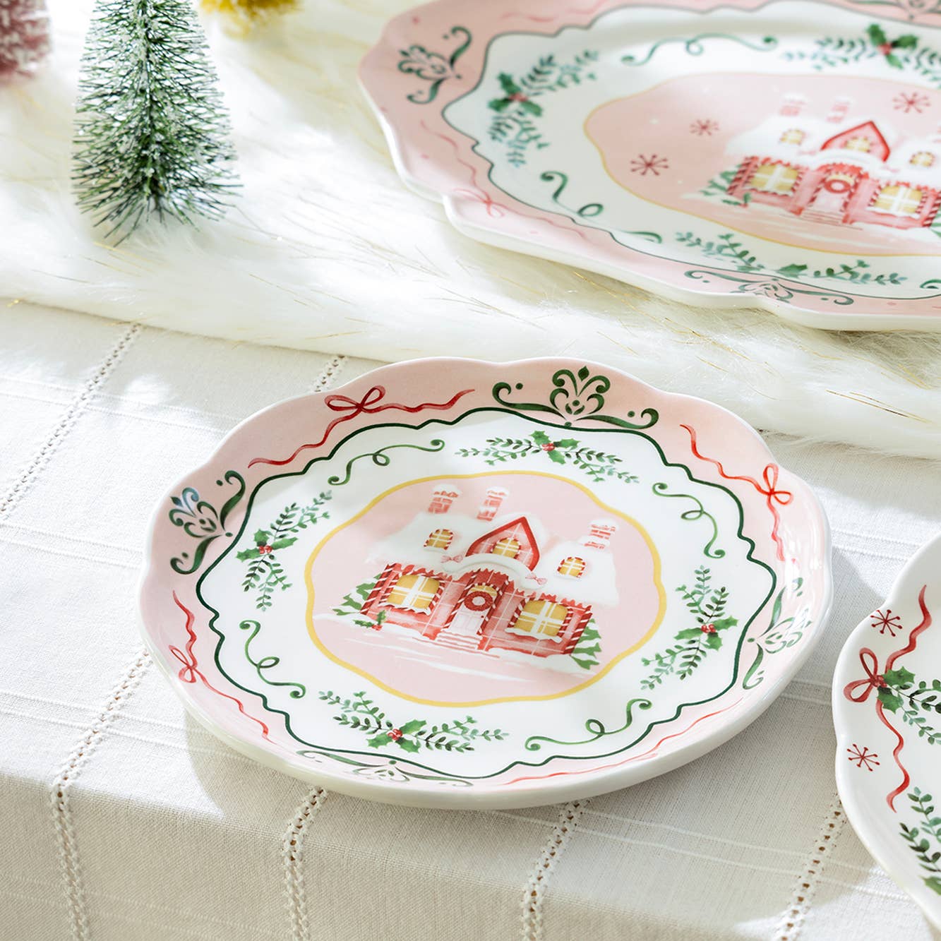 Bring festive cheer to your holiday table with this whimsical Christmas House Pink Dessert Plate. Featuring a charming gingerbread-inspired house design adorned with delicate bow and holly details, this plate transforms dessert time into a magical celebration. The soft pink backdrop creates an elegant yet playful aesthetic that complements both traditional and modern holiday décor. Perfect for serving seasonal treats, displaying holiday cookies, or adding a touch of yuletide wonder to your gatherings.