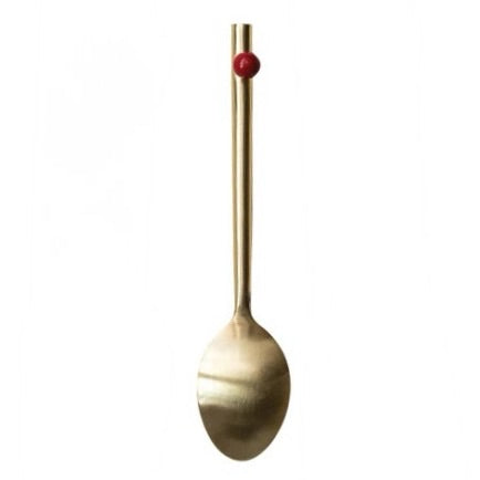 Discover refined dining with this exquisite gold finish stainless steel spoon, crafted to bring warmth and sophistication to your table. The gleaming gold plating creates an upscale aesthetic that complements any dinnerware collection, while premium stainless steel guarantees durability through countless meals. An eye-catching enameled red ball accent on the handle adds a distinctive flair and makes this piece a conversation starter.
