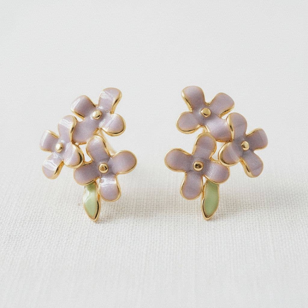 Elevate your everyday style with these charming Vintage Enamel Purple Flower Stud Earrings. Featuring delicate enamel work in a beautiful purple hue, these stud earrings offer a touch of light luxury and artistic flair, perfect for adding a subtle pop of color to any outfit. Their versatile design makes them a delightful accessory for various occasions.