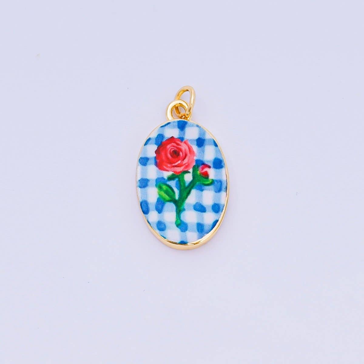Brighten your jewelry collection with this vibrant Enamel Spring Collection Charm, featuring a single rose enamel design on the front. Crafted from brass and 24K gold-filled materials with beautiful hand-painted enamel detailing, this petite charm measures 23.1mm x 14.1mm x 3.1mm—the perfect size for bracelets, necklaces, or charm collections. Lead-free and nickel-free, it's safe for sensitive skin and designed to last. A delightful accent piece.