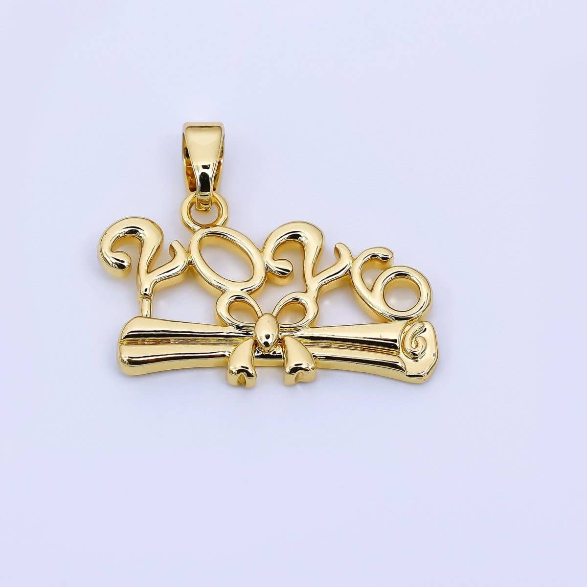 Celebrate our 2026 graduates with this 24K gold filled diploma charm! The perfect addition to any bracelet, necklace or bag charm.