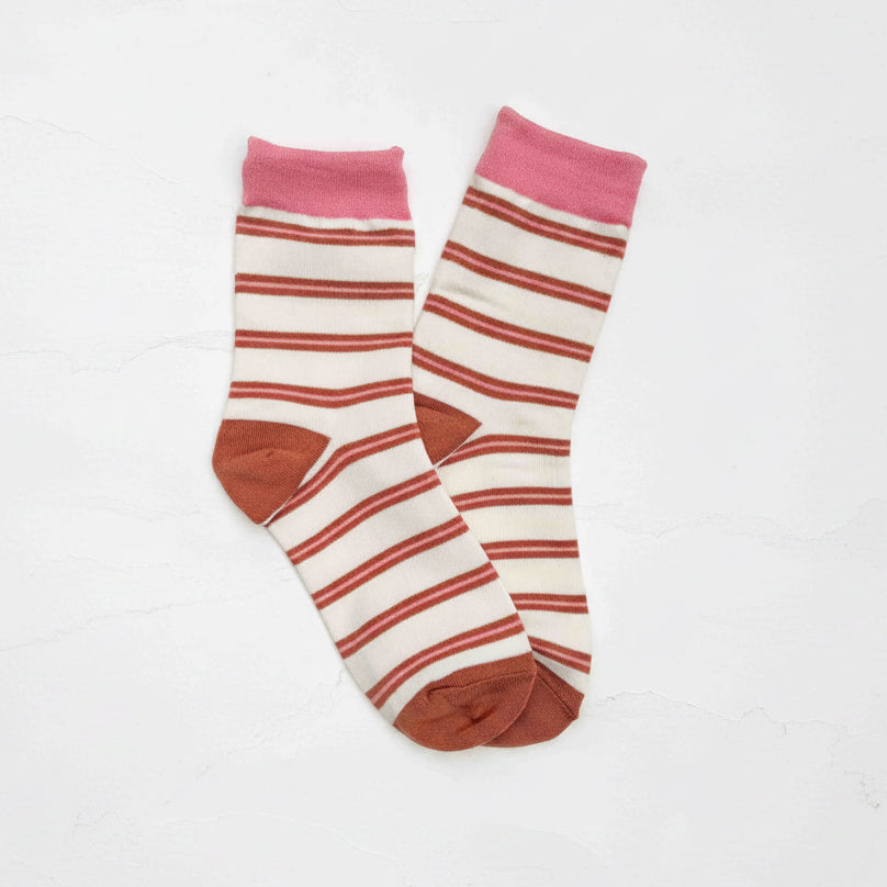 Add a timeless touch to your everyday wardrobe with these soft, comfortable striped crew socks. Featuring a classic stripe pattern with contrasting heel, toe, and cuff colors, they're perfect for casual outfits year-round.