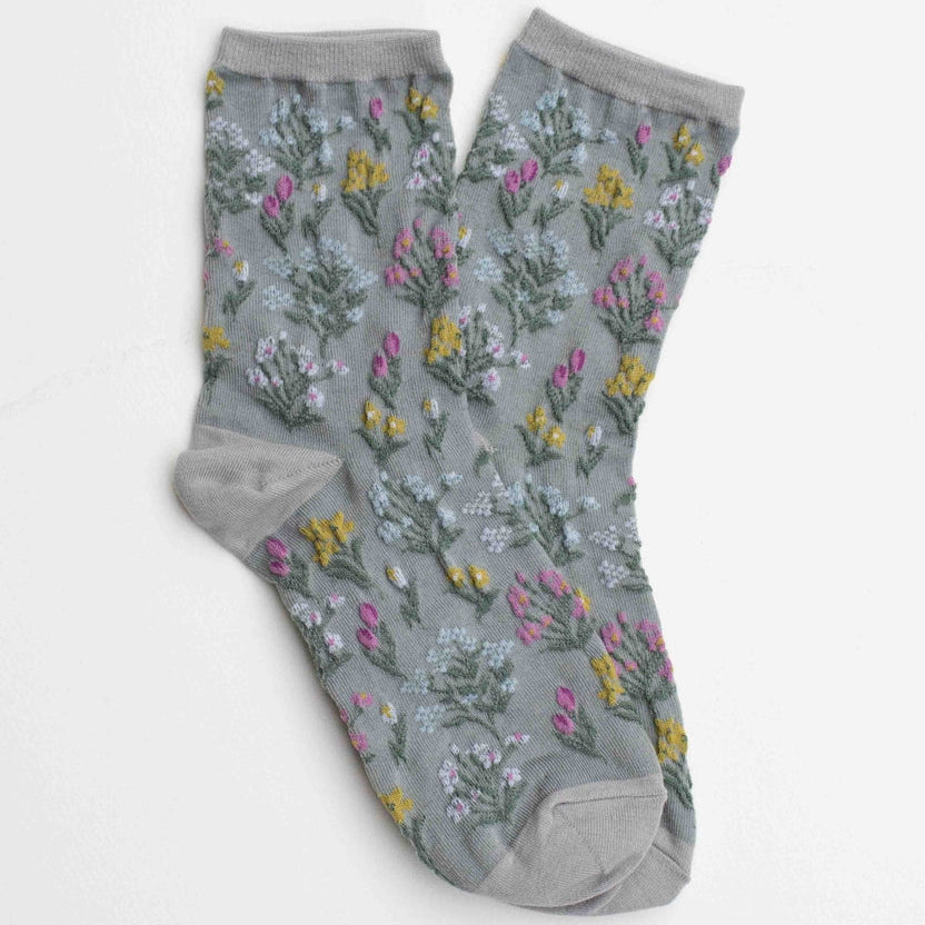 Step into nature’s charm with these embroidered floral crew socks. Designed with delicate wildflower patterns, they add a whimsical touch to your everyday outfits while offering comfort and durability.

Perfect for pairing with sneakers, loafers, or boots, these floral socks bring a fresh and playful accent to any look.