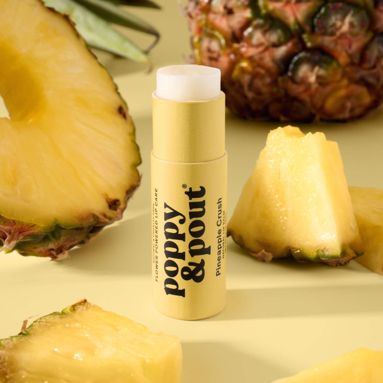 Sweet pineapple meets fluffy marshmallow in this playful tropical blend. Bright, fruity, and candy-like, Pineapple Crush brings vacation vibes wherever you go.

Made with 100% natural ingredients, this lip balm is hand-poured in the USA and packaged in our eco-friendly recyclable cardboard tube. It's cruelty-free, Leaping Bunny certified, and crafted to keep lips soft, smooth, and nourished.