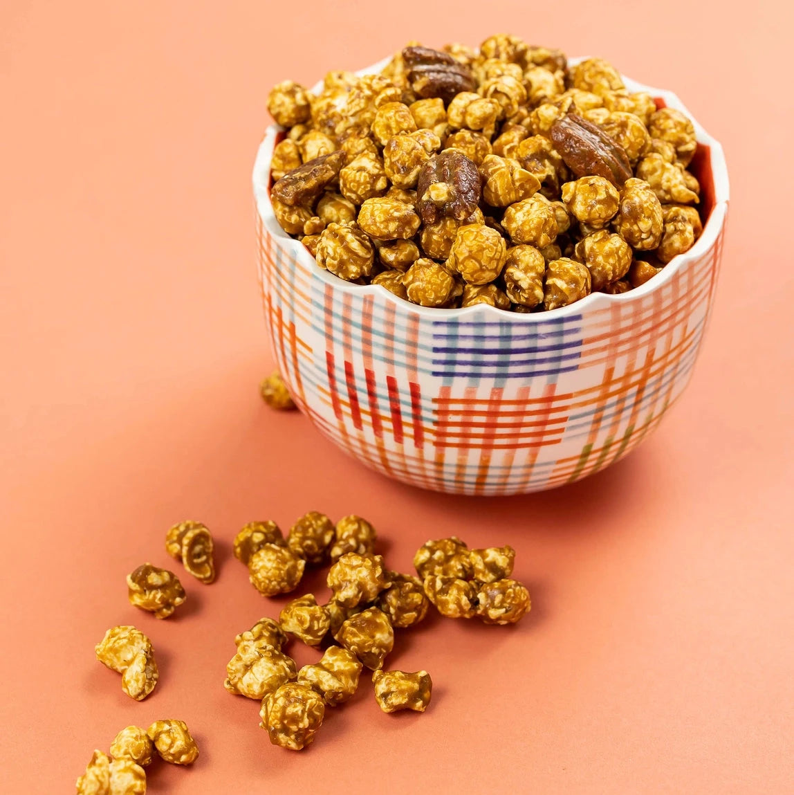 A close second to your grandma's pecan pie. Our famous Salted Caramel popcorn made with a maple infusion and maple pecans. It's the whole pie, without the baking time!