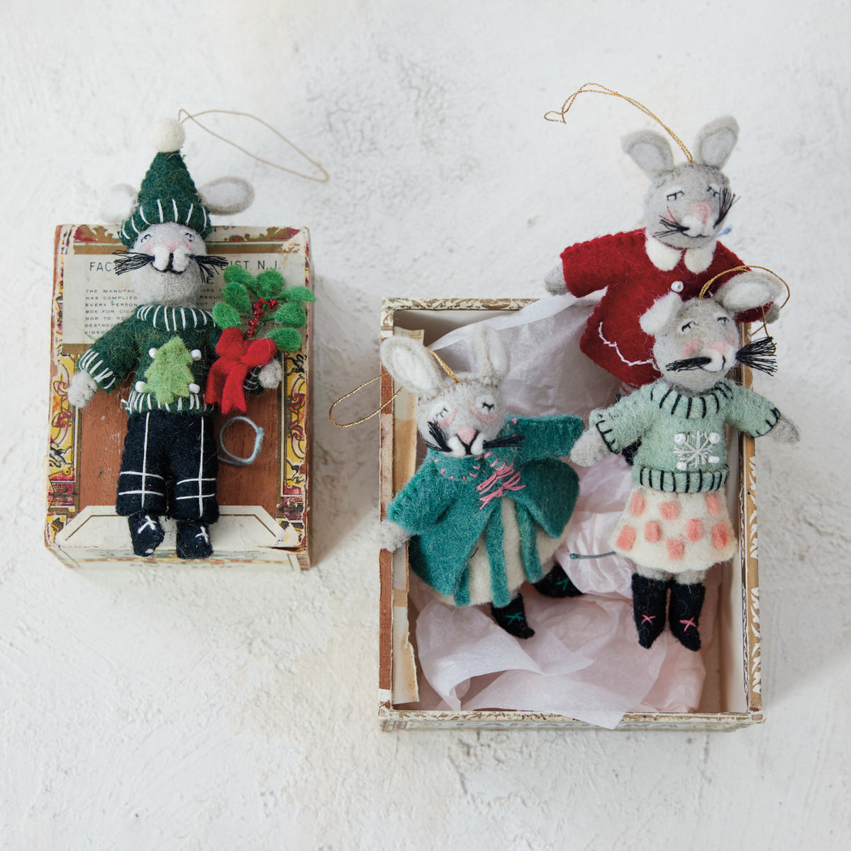 Bring cozy charm and heartwarming joy to your holiday decor with this adorable handmade wool felt mouse ornament. Dressed in sweet winter clothes and detailed with delicate embroidery and sparkling beads, this whimsical little friend adds a loving, festive touch to any Christmas tree or holiday display.