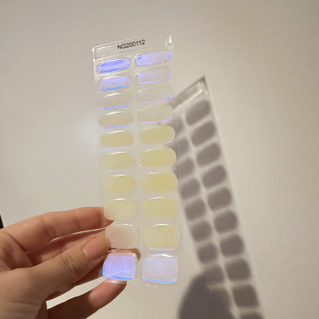 Translucent, buttery cream color with electric blue iridescent effect that changes in the light!
