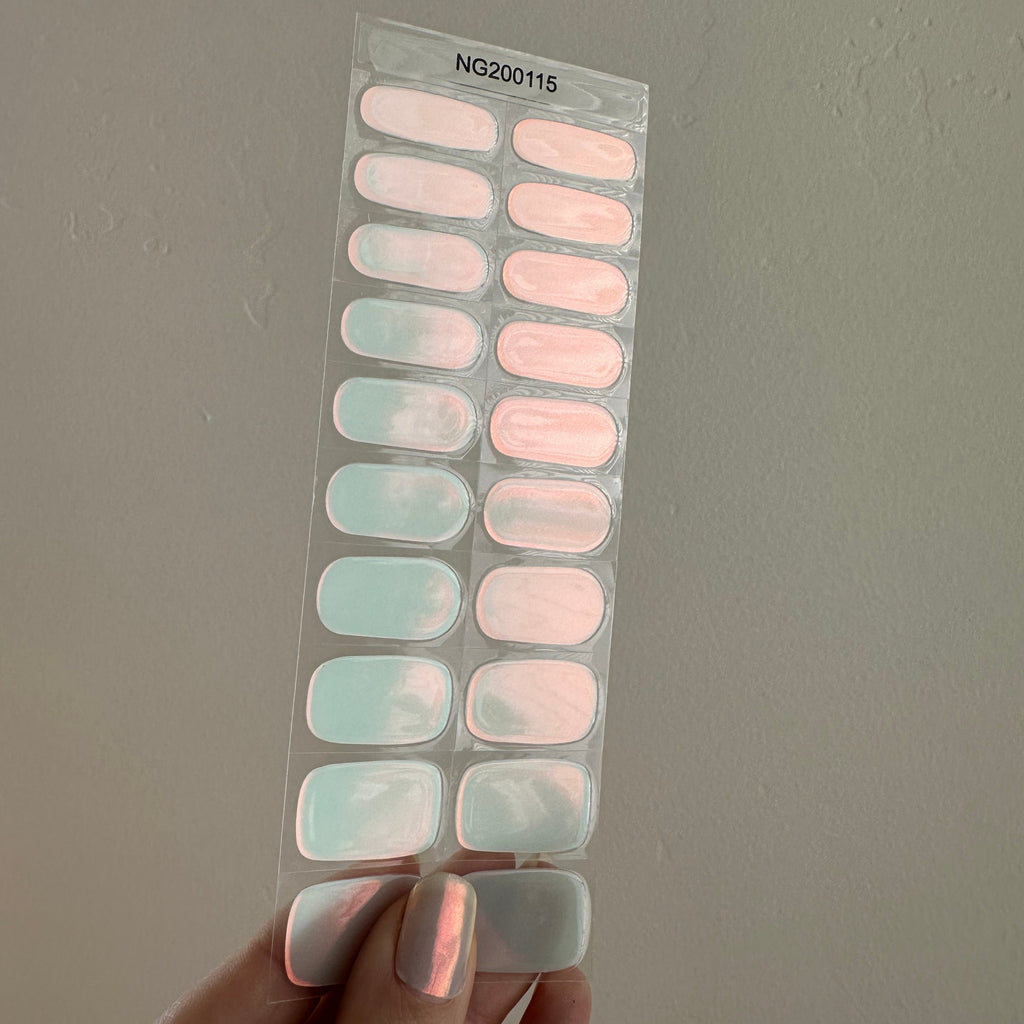 Translucent, pale blue color with gold and hot pink iridescent effect that changes in the light!