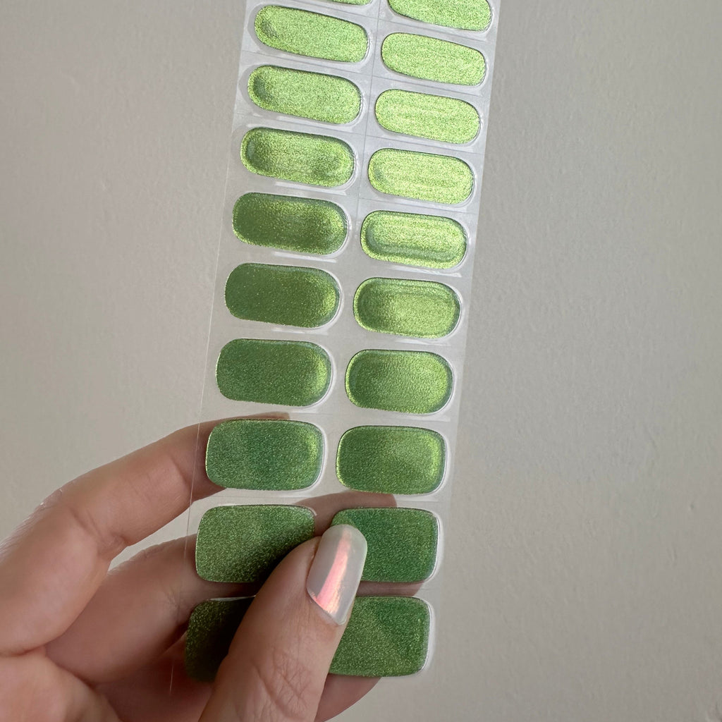 Holographic, lime green micro glitter nails. A little bit Y2K, a little bit disco.