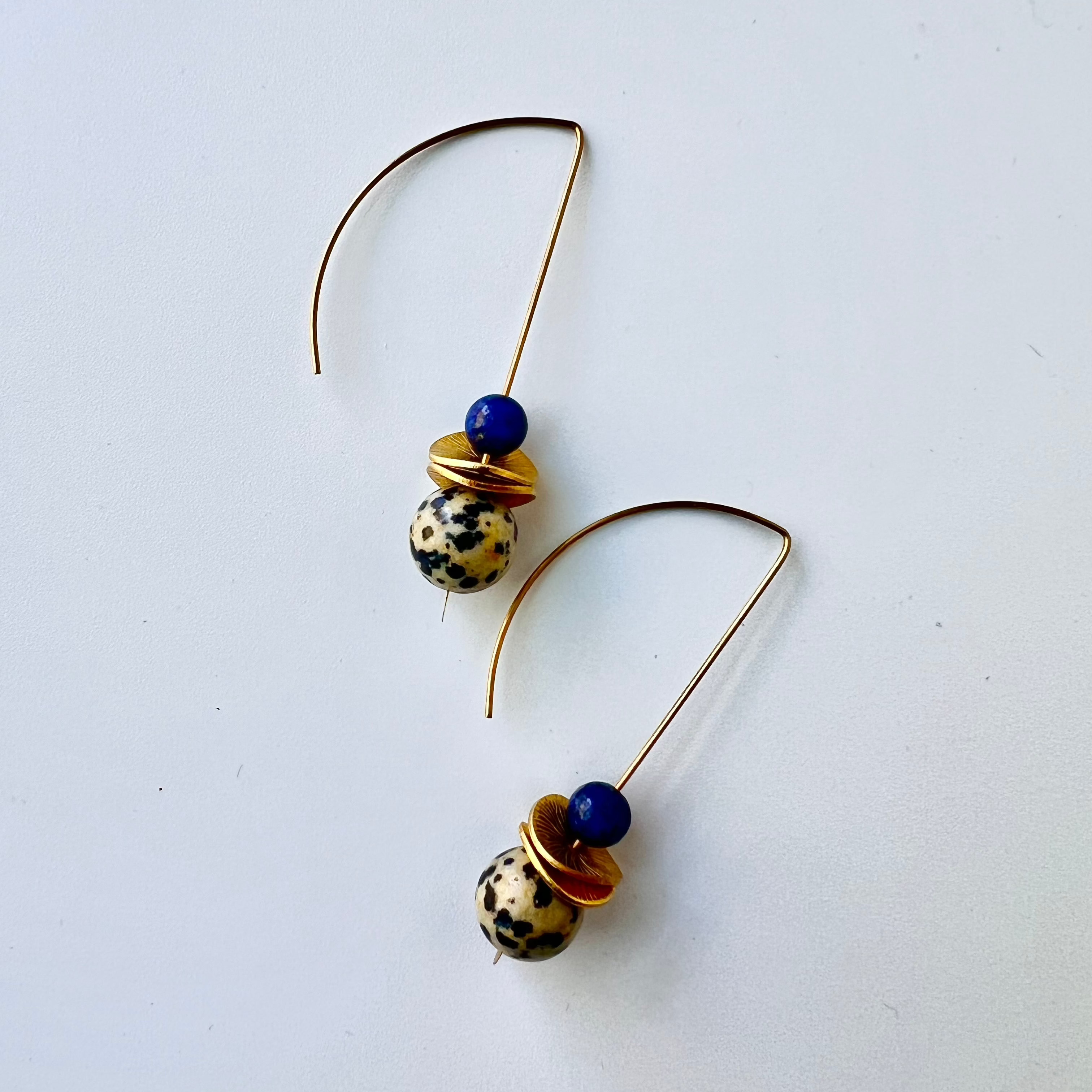 Black and white w/ blue accent bead drop earrings on crescent ear wire