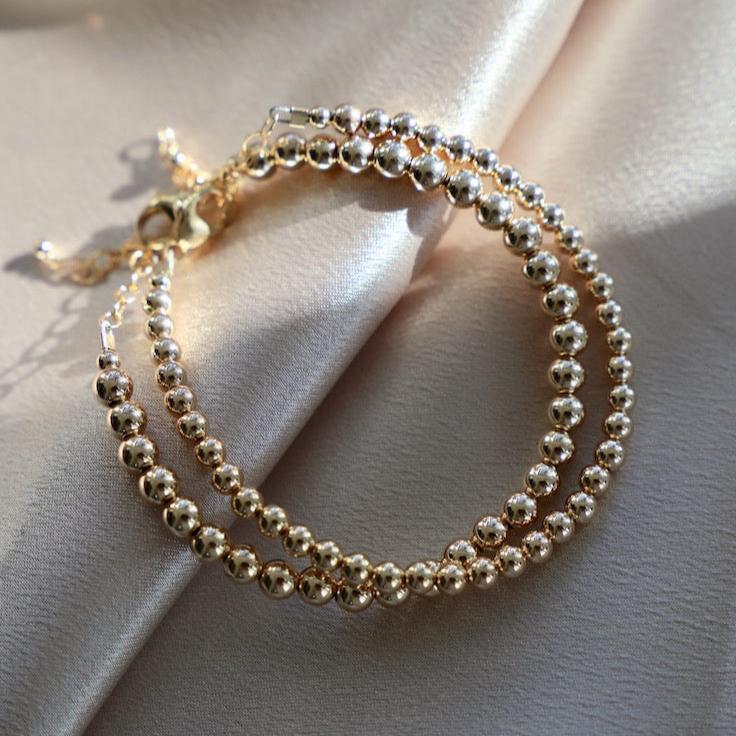 An absolute must have for any bracelet stack, these Gold Filled Beaded Bracelets are the perfect way to elevate your jewelry collection. We love to stack multiple sizes for the ultimate look.