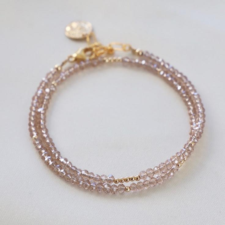 The Petite Champagne Double Wrap Bracelet with Gold Accents is the ultimate fashion accessory.