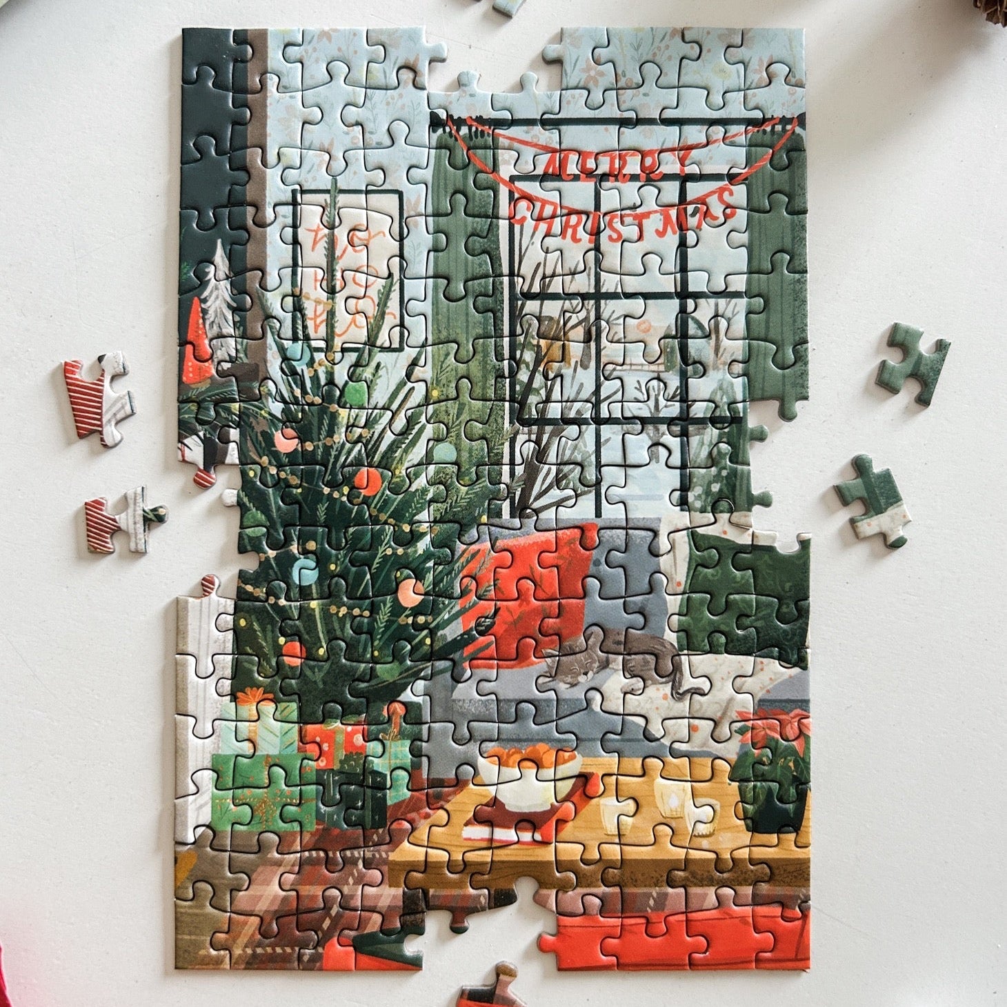 Partially completed puzzle against a white background. 