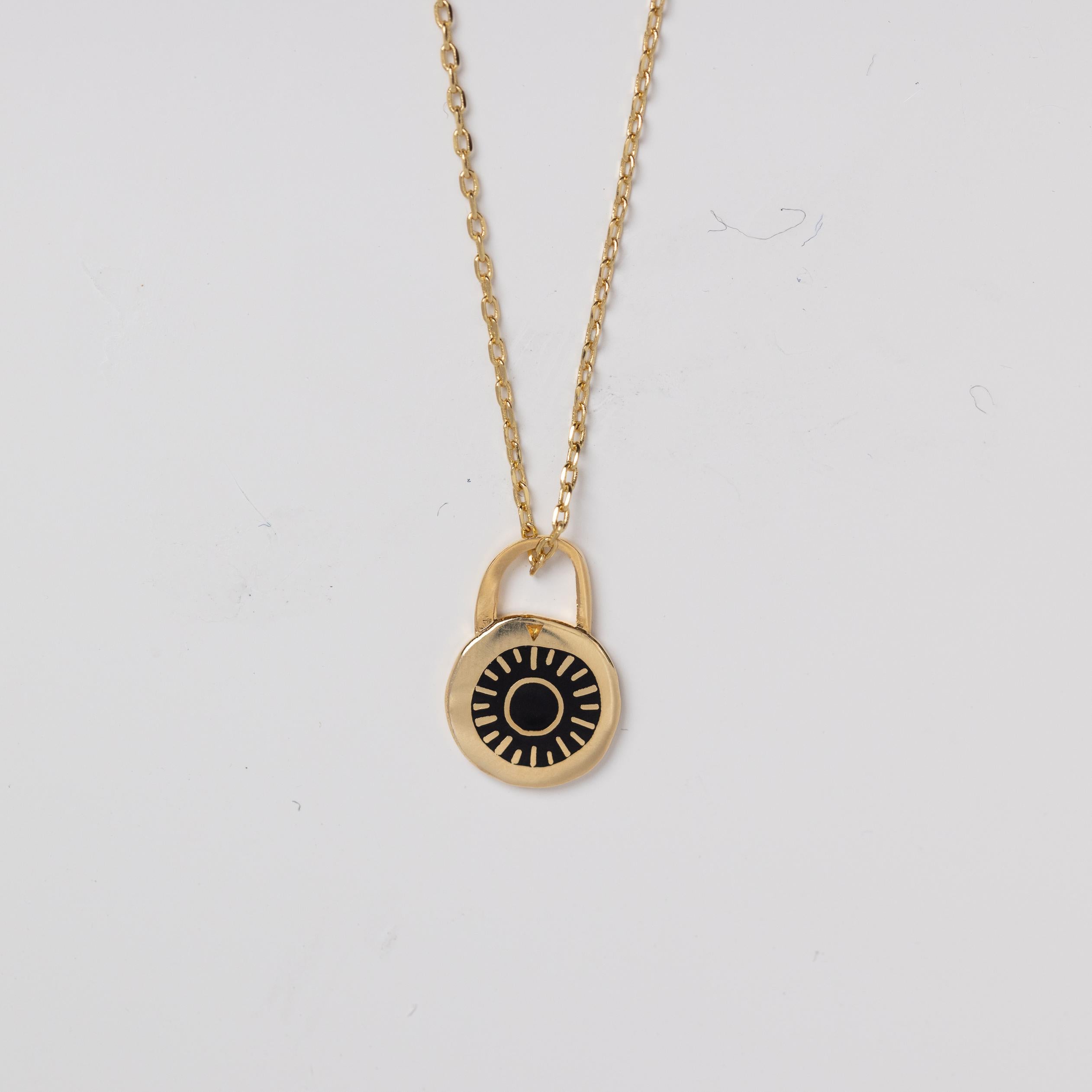 Master Lock Pendant is gilded in luminous 22-karat gold on a soldered 18-karat gold dipped chain.

* Each pendant is about 1" (2.5 cm). Chain is 20" (50.8 cm) long with clasp.