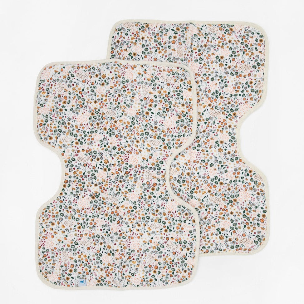 There's no use crying over spilled milk. With 4 absorbent layers of cotton muslin and an innovative shape, our burp cloth keeps you clean and dry while baby's snuggled tight.    Cotton Muslin Burp Cloth 2 Pack - Pressed Petals 