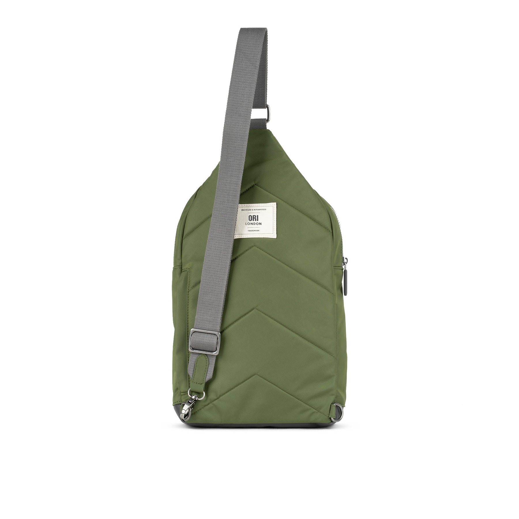 Sling on and hit the road with our brand new extra large Willesden sling bag that now fits in a 13 to 15-inch laptop!

Made using recycled material, the Willesden bag is the crossbody bag you've been looking for. With a front zip pocket on the outside and an organizational panel inside, you'll have everything you need right where you need it! There’s also a secret pocket on the back which means you can be on the go – worry-free and hands-free! Avocado green.