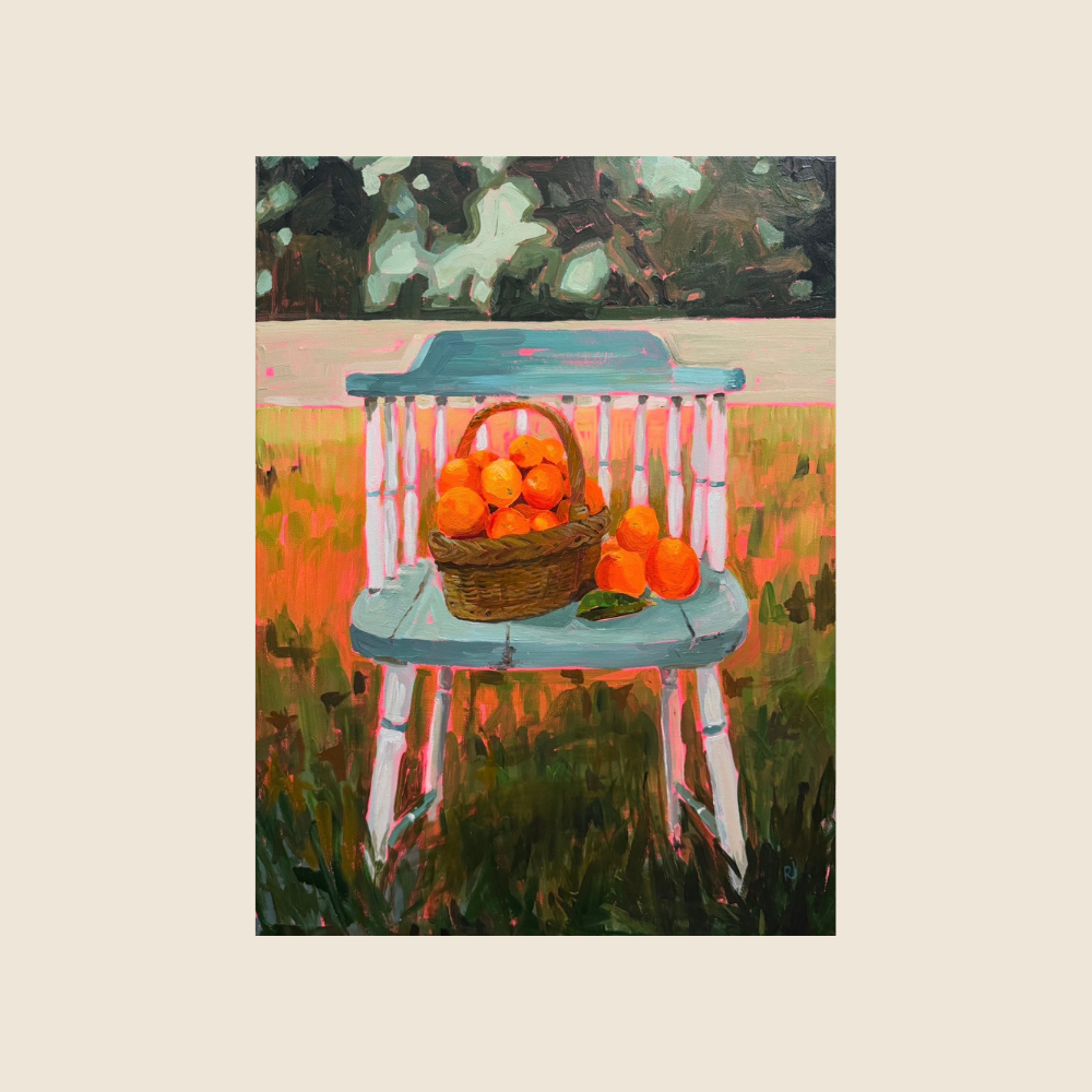 Blue and white chair, with oranges resting in a basket on the seat of the chari, in a green field, warm orange glow on the grass.