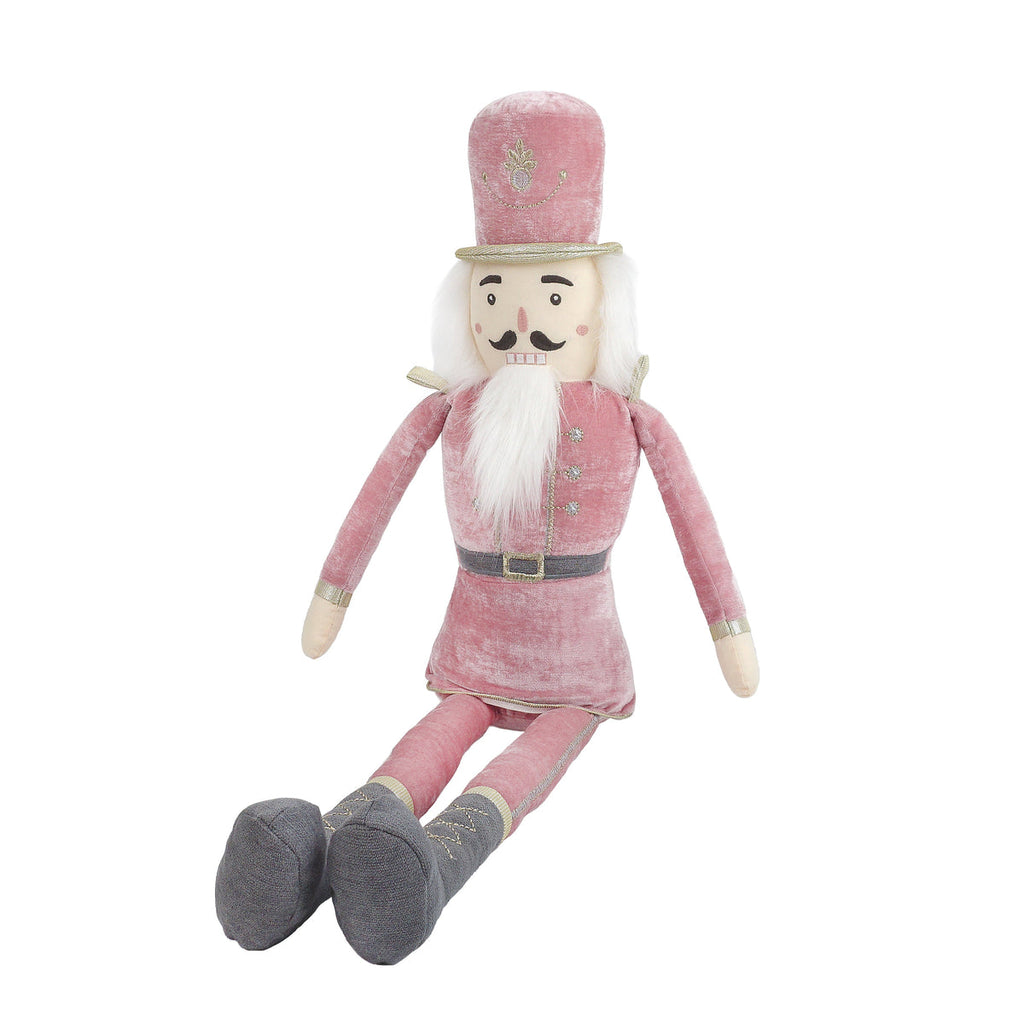 It's that time of year, and our Nutcracker Doll is the perfect accent to any home at the holidays. Adorned is best selling rose pink, he is perfect for shelves, and mantles.   100% Polyester  Measures 29 in  Spot clean only