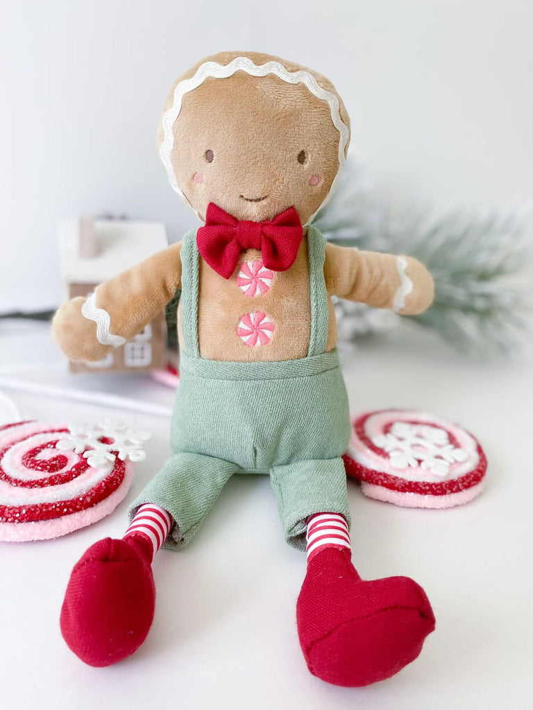 Oh snap! Mon Ami’s Gingerbread Boy Plush Toy is no cookie cutter Christmas plush doll. Festively dressed in green overalls, peppermint buttons and a burgundy bow tie and detailed with a darling embroidered face, our Christmas plush doll ups your gingerbread game. Wish someone a dough-lightful holiday season with this ultra-cuddly and ultra-cute Christmas plush doll.