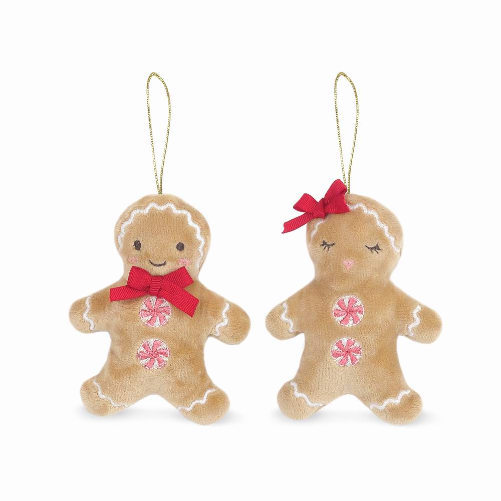 Gingerbread Ornaments are the holiday season’s hottest accessories. Exquisitely detailed with festive red ribbons, peppermint buttons and charming embroidered faces, these Christmas plush ornaments are a must for your tree. The dynamic duo is topped with a sturdy metallic thread making these Christmas plush ornaments easy to hang on a tree or around the house. Buy alone or together.  FYI: They also make fantastic gift toppers.