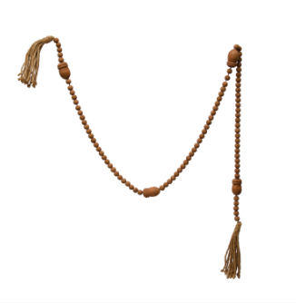 Elevate any room's décor with this wood bead garland, complete with rustic acorns to add a touch of nature and jute tassels to give it some texture. A home accessory with personality and style, it's sure to create a conversation starter - or at least, some seriously good vibes!     Size  72"L