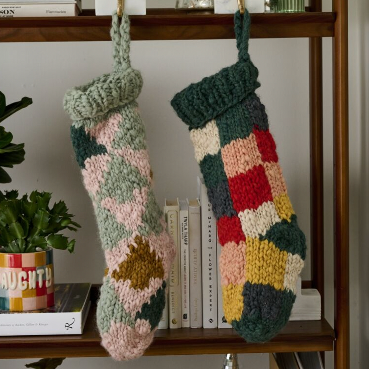 Introducing the Cottage Stocking in a charming checker design! Hang this cozy stocking on your mantel to add a whimsical touch to your holiday decor. This stocking is sure to bring festive cheer to your home and Santa will have no trouble finding it!