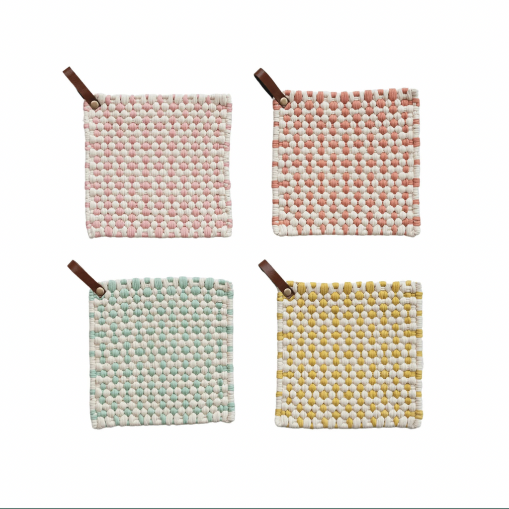 This square cotton crocheted pot holder with a leather loop is a cozy and rustic addition to the home or office kitchen. It features a square shape and a cotton crocheted design providing protection from hot pots and pans. The holder's leather loop allows easy storage and access.
