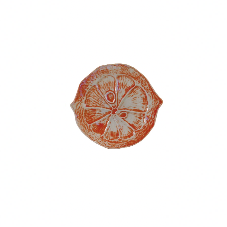 Brighten up your table with our Stoneware Citrus Shaped Plate! Available in 3 vibrant colors, this playful and quirky plate will bring a pop of fun to any meal. Made from durable stoneware, it's perfect for serving up all your favorite dishes. Add a slice of happiness to your dining experience today! 6-3/4"L x 6"W. Orange