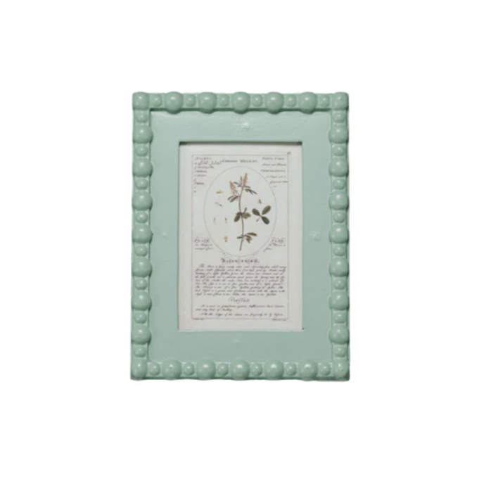 Mint green 6-1/4"W x 8-1/2"H. Holds 5" x 7" Photo. Vintage photo inside