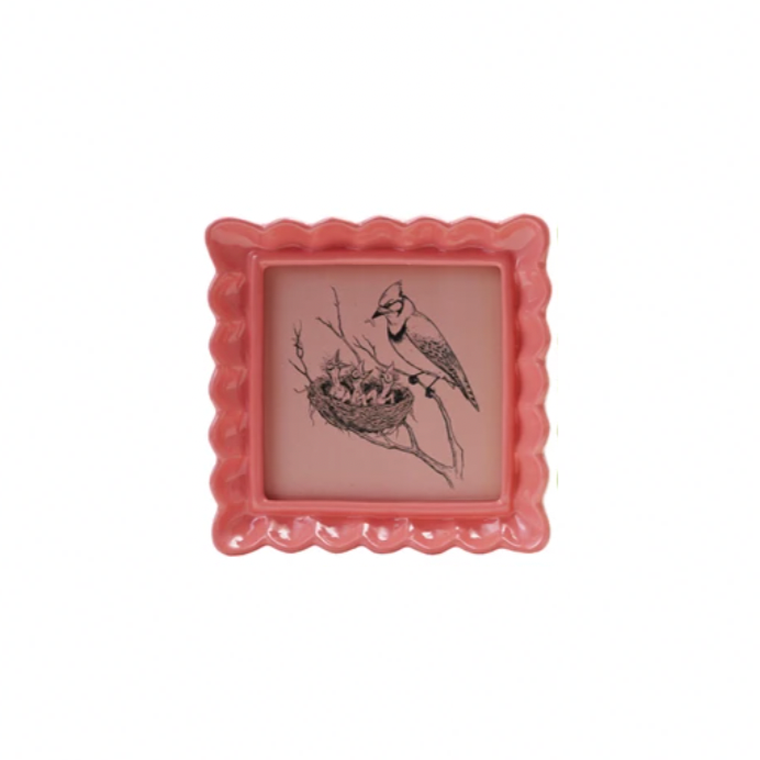 Display your memories with a twist in our Resin Wavy Photo Frame! Its unique design adds a playful touch to any space. Available in 4 fun colors, this frame is sure to make your photos pop! Perfect for those who love to add a little quirk to their decor. 5-1/4" Coral Pink