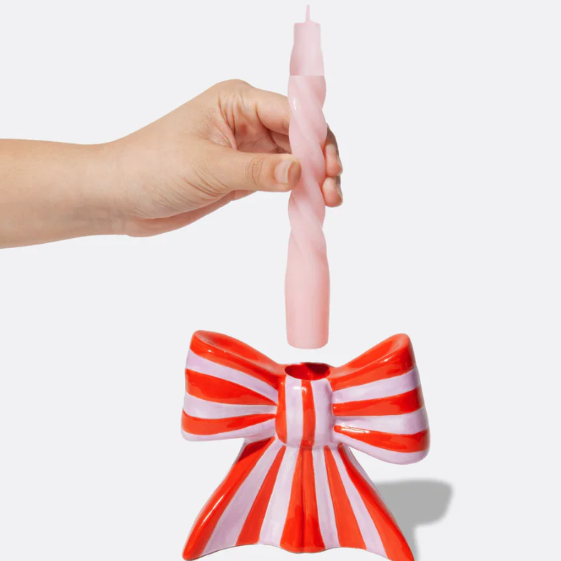 Ceramic candle holder shaped as a bow, taking inspiration from the ethereal ballet world and the whimsical allure of coquetry.&nbsp;