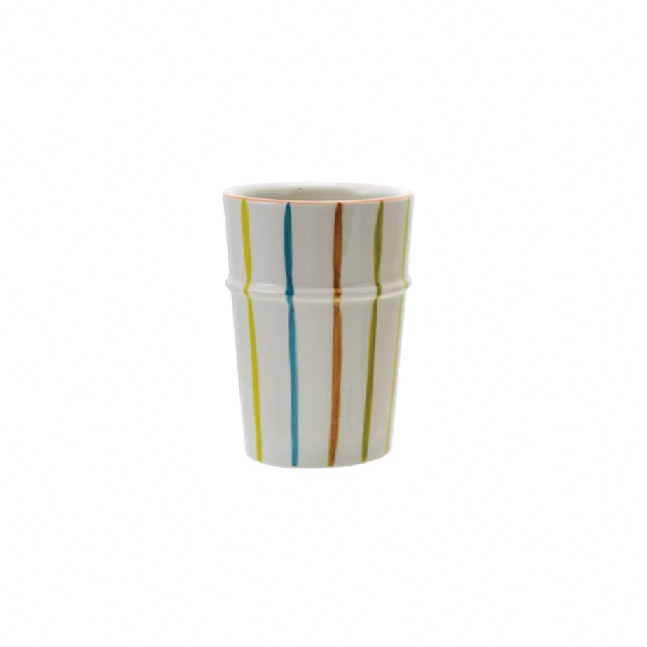 Brighten your day with this Hand-Painted Stoneware Striped Cup, featuring cheerful multi-colored stripes that add a splash of fun to every sip. Crafted from durable stoneware, it’s perfect for your morning coffee or afternoon tea, making every drink feel like a little celebration. 3-1/4" Round x 4-1/2"H. 12 oz. Green &amp; Blue Striped