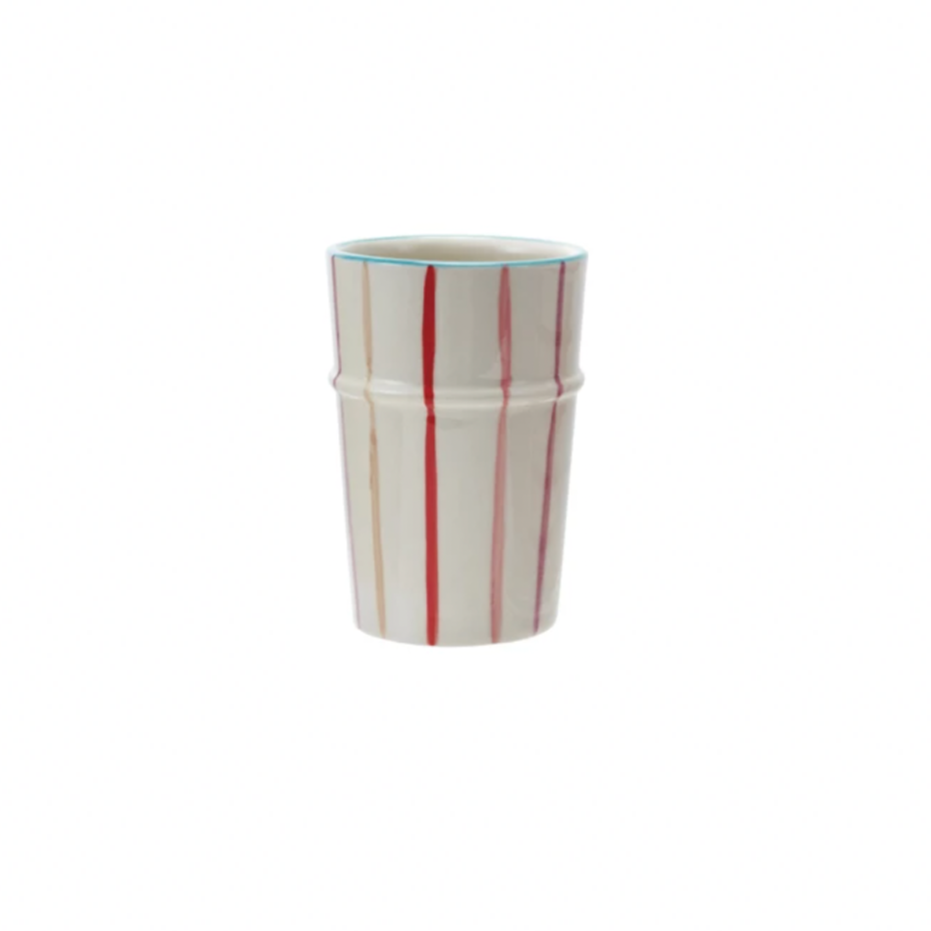 Brighten your day with this Hand-Painted Stoneware Striped Cup, featuring cheerful multi-colored stripes that add a splash of fun to every sip. Crafted from durable stoneware, it’s perfect for your morning coffee or afternoon tea, making every drink feel like a little celebration. 3-1/4" Round x 4-1/2"H. 12 oz. Pink &amp; Red Striped