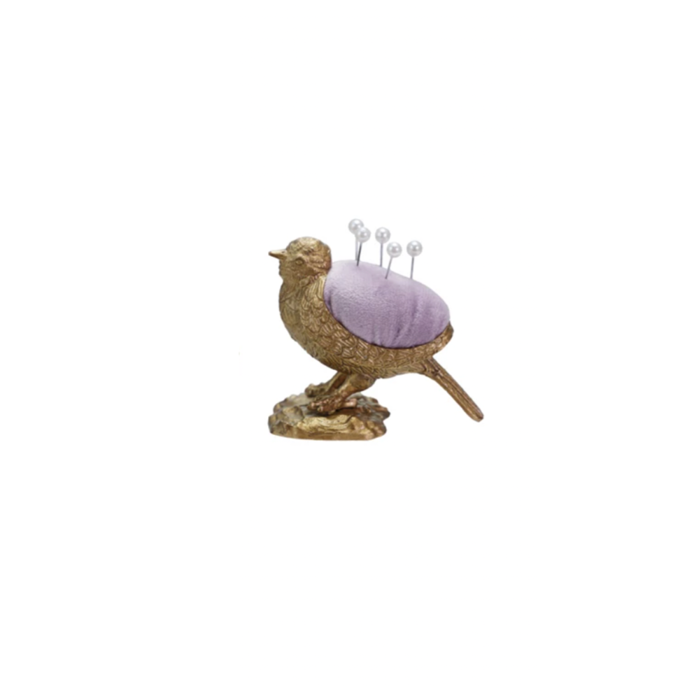 Add a touch of whimsy to your sewing kit with this Bird Velvet Pin Cushion! Soft velvet forms the charming snail shape, making it both adorable and practical. It comes with five pearl head pins, perfect for keeping your needles handy and stylish. Brighten up your crafting space with this playful and functional companion. Approximately 3"L&nbsp;