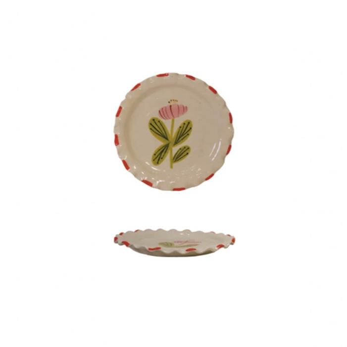 Add a splash of charm to your table with this Hand-Painted Stoneware Plate featuring a delightful ruffled edge and a whimsical pink flower &amp; green leaves design. Each plate is uniquely crafted, bringing a touch of artistry and fun to every meal. Perfect for serving up your favorite dishes with a playful twist! 8-1/2" Round