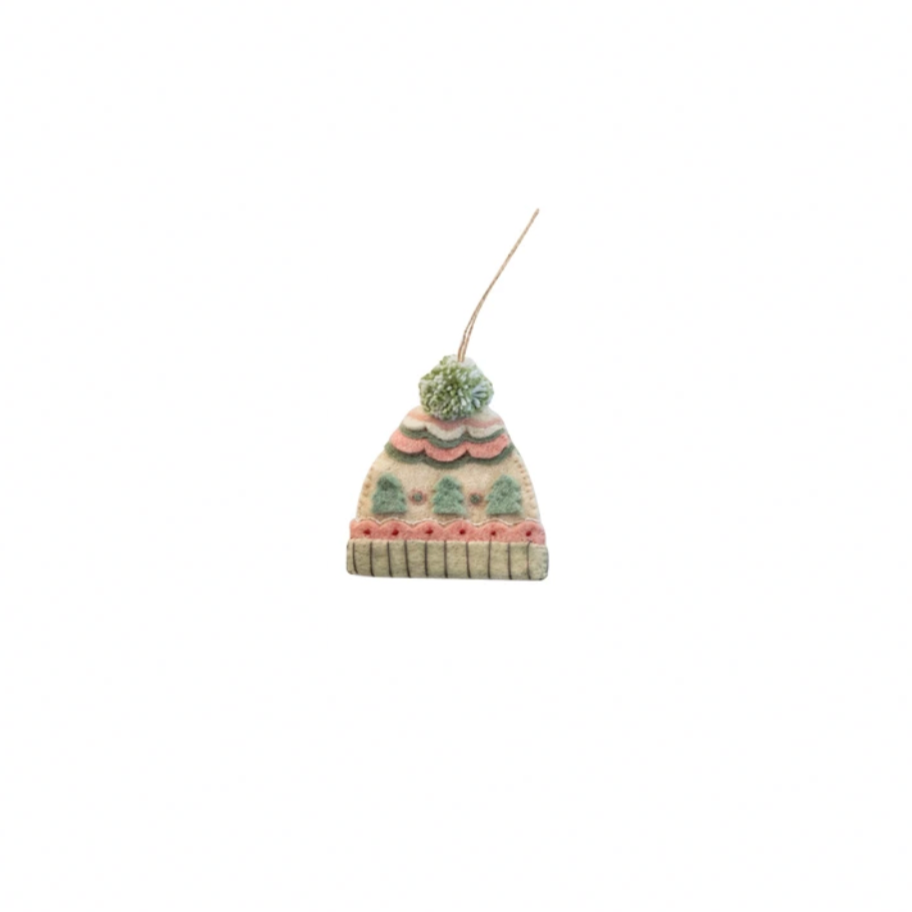 Knitted hat with a decorative bow on a white background
