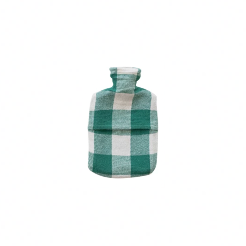 Green and white checkered hot water bottle on a white background