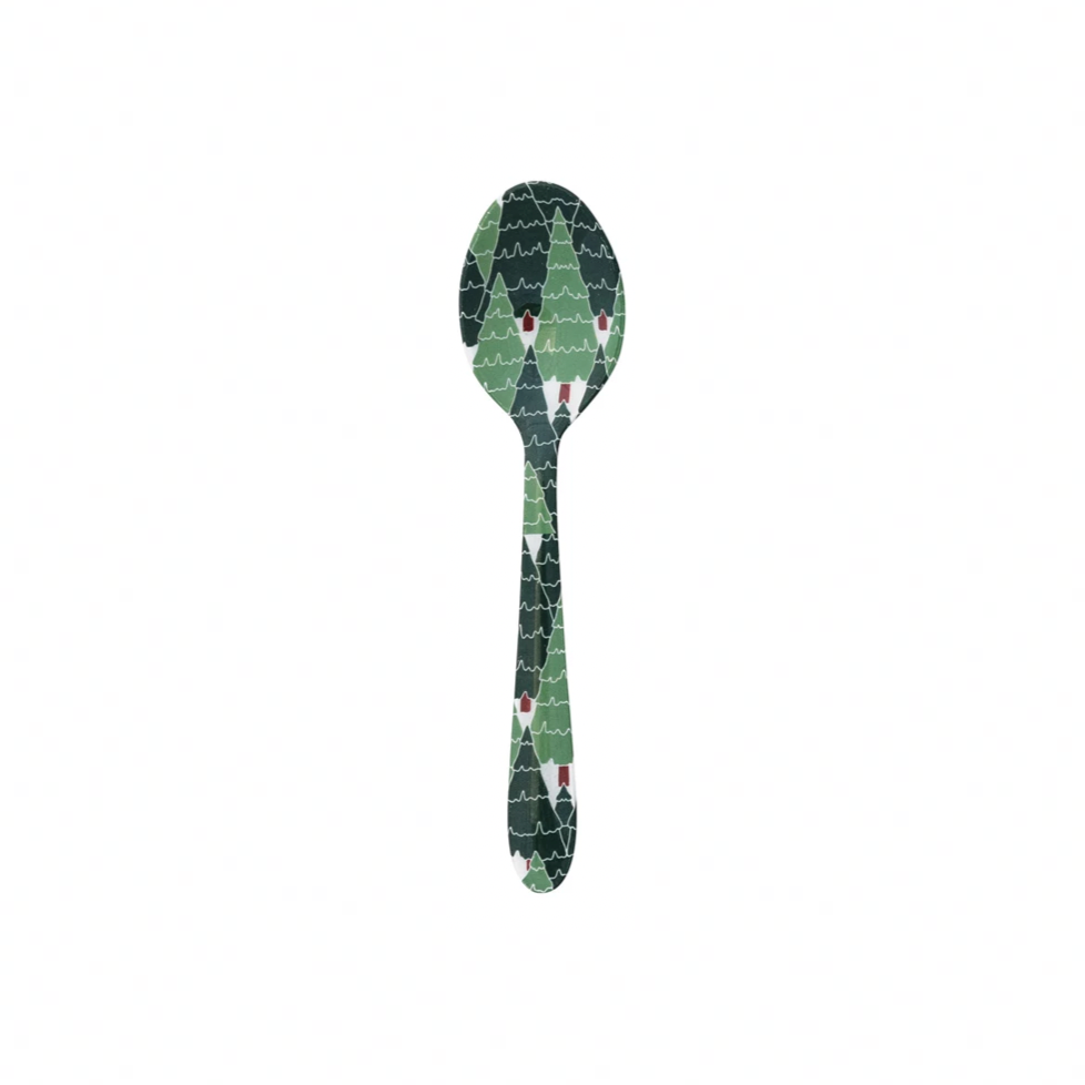 Spoon with a green mosaic pattern on a white background