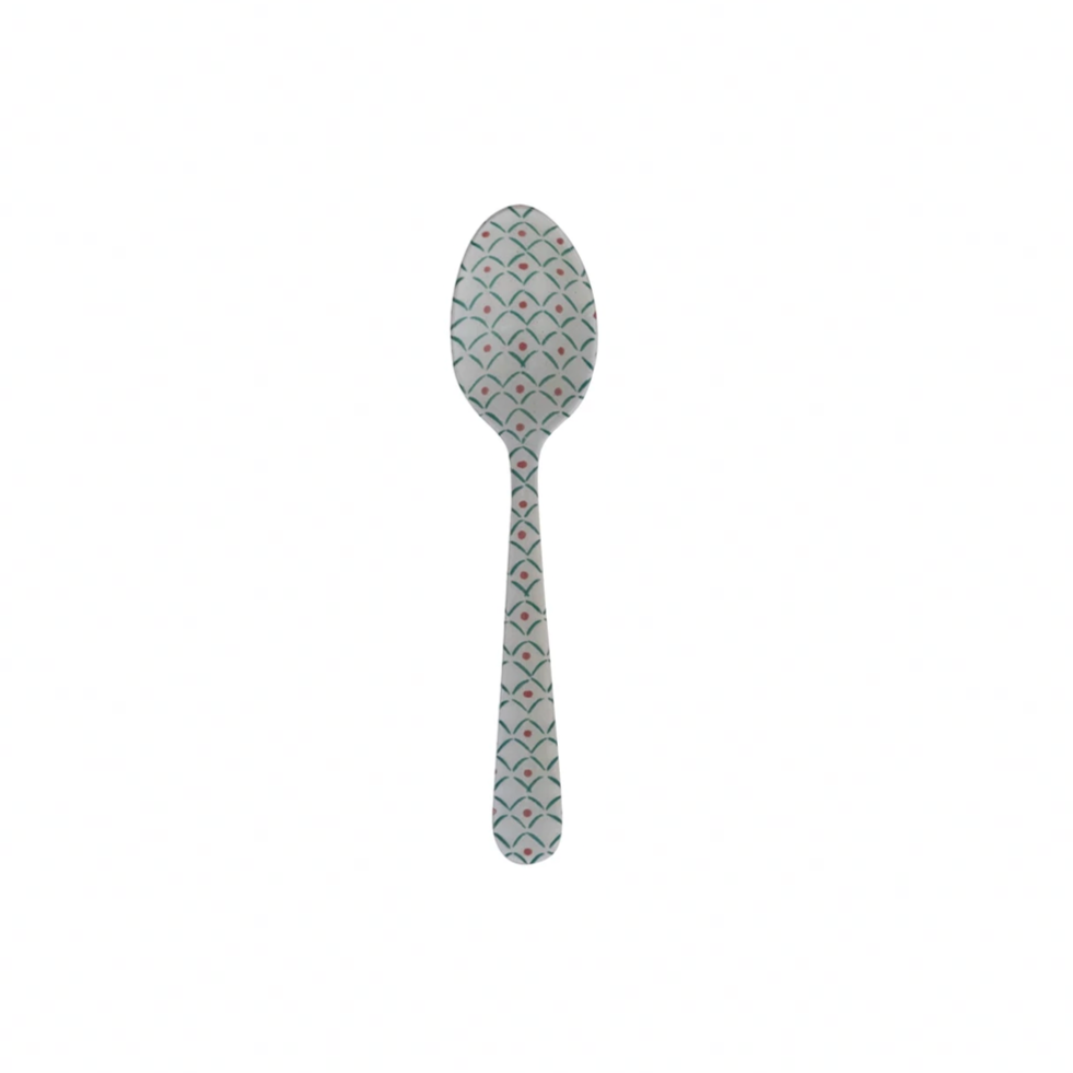 Spoon with decorative pattern on a white background