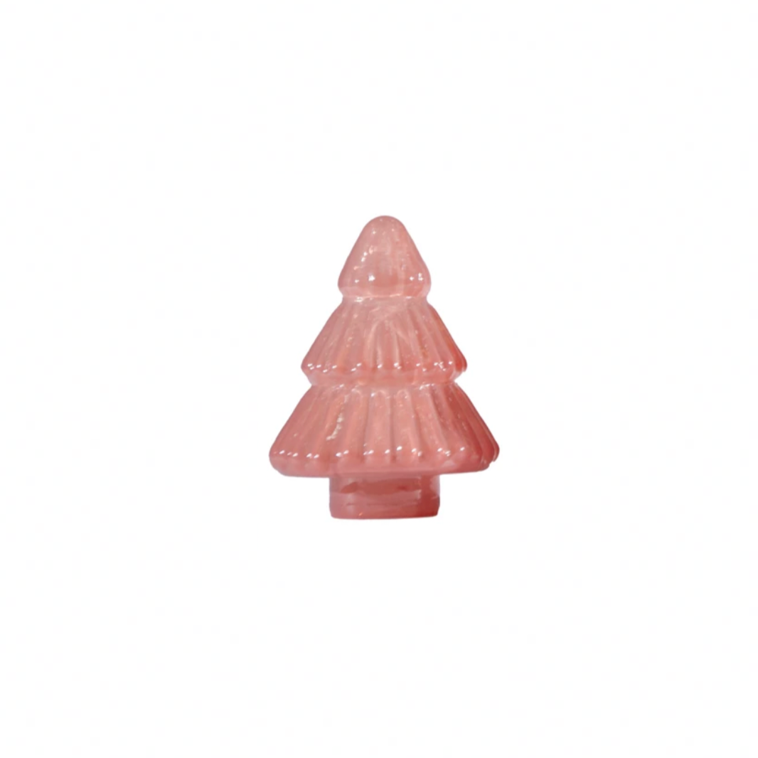 Pink Christmas tree-shaped ornament on a white background