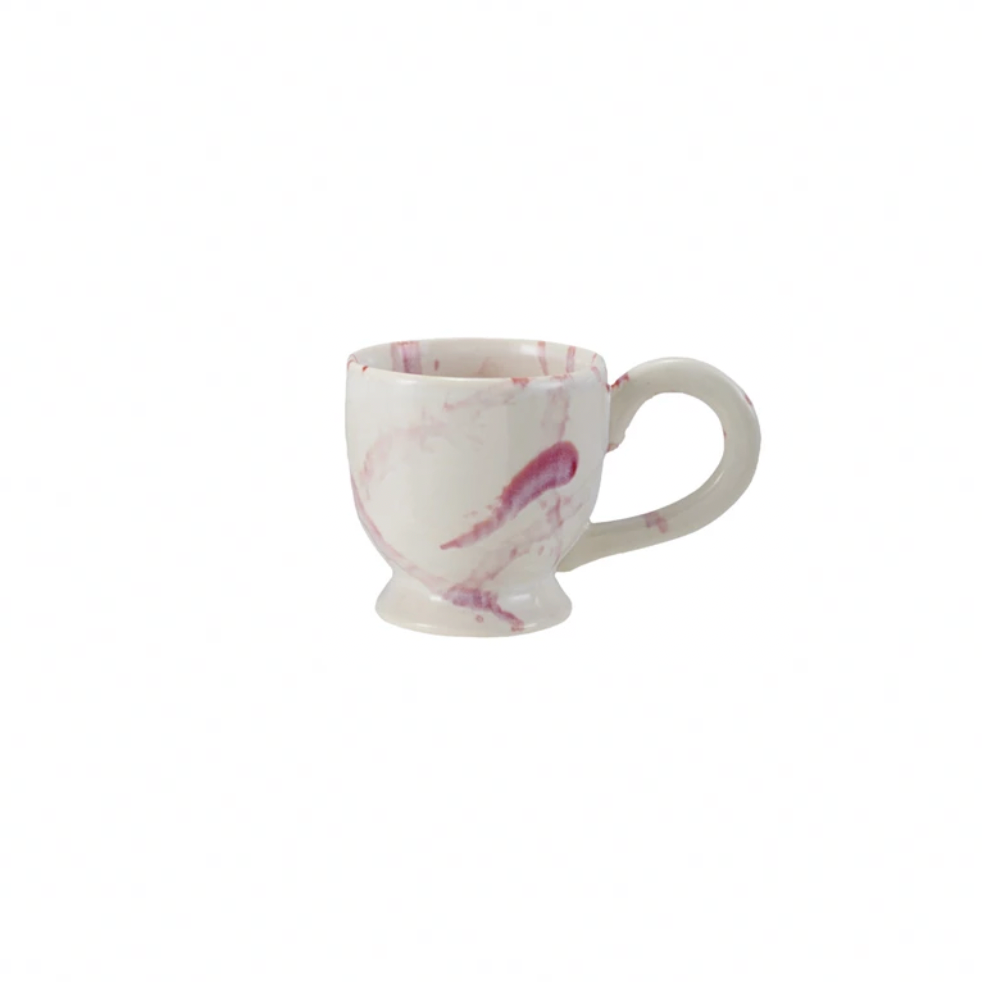 Pink Marble-patterned ceramic mug on a white background