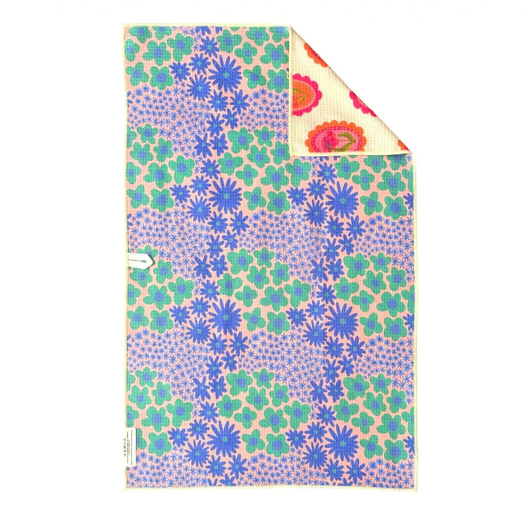 Colorful floral-patterned fabric on a white background
