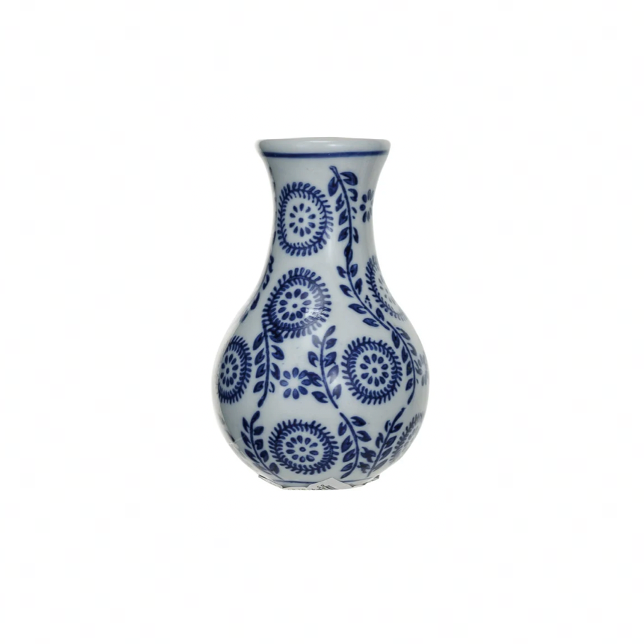 White vase with blue floral patterns on a white background