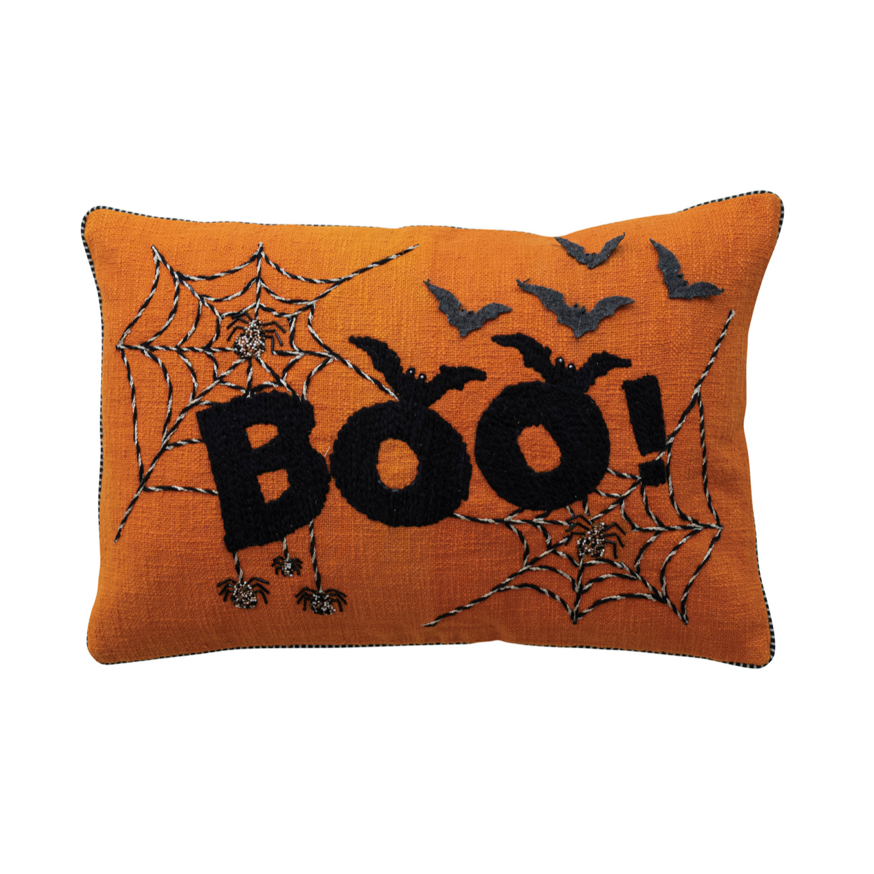 An orange rectangular Halloween throw pillow featuring black embroidered 'BOO!' lettering, spiderwebs, bats, and spiders on a white background.