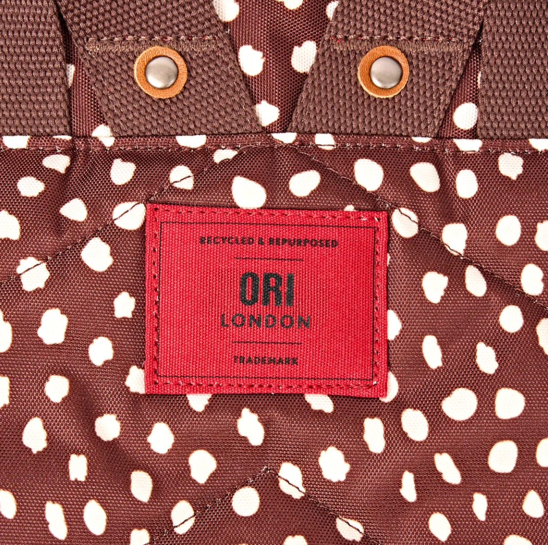 Canfield Roll Top Backpack in Brown Dot