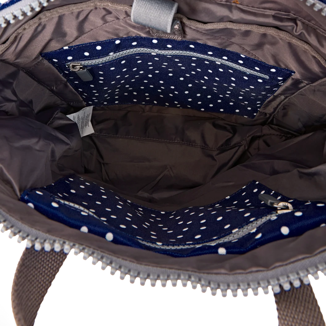 Canfield Roll Top Backpack in Navy Polka Dot