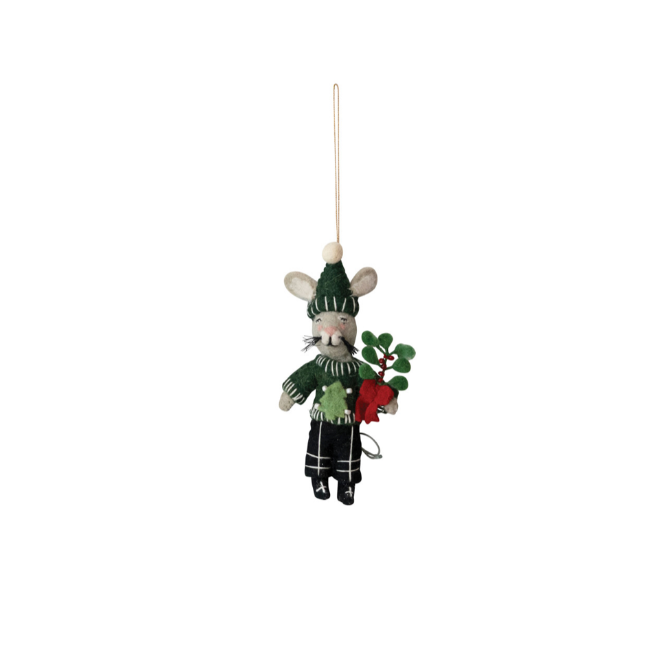 A small hanging ornament shaped like a mouse dressed in a green knit hat and sweater, holding a red berry sprig, on a plain white background.