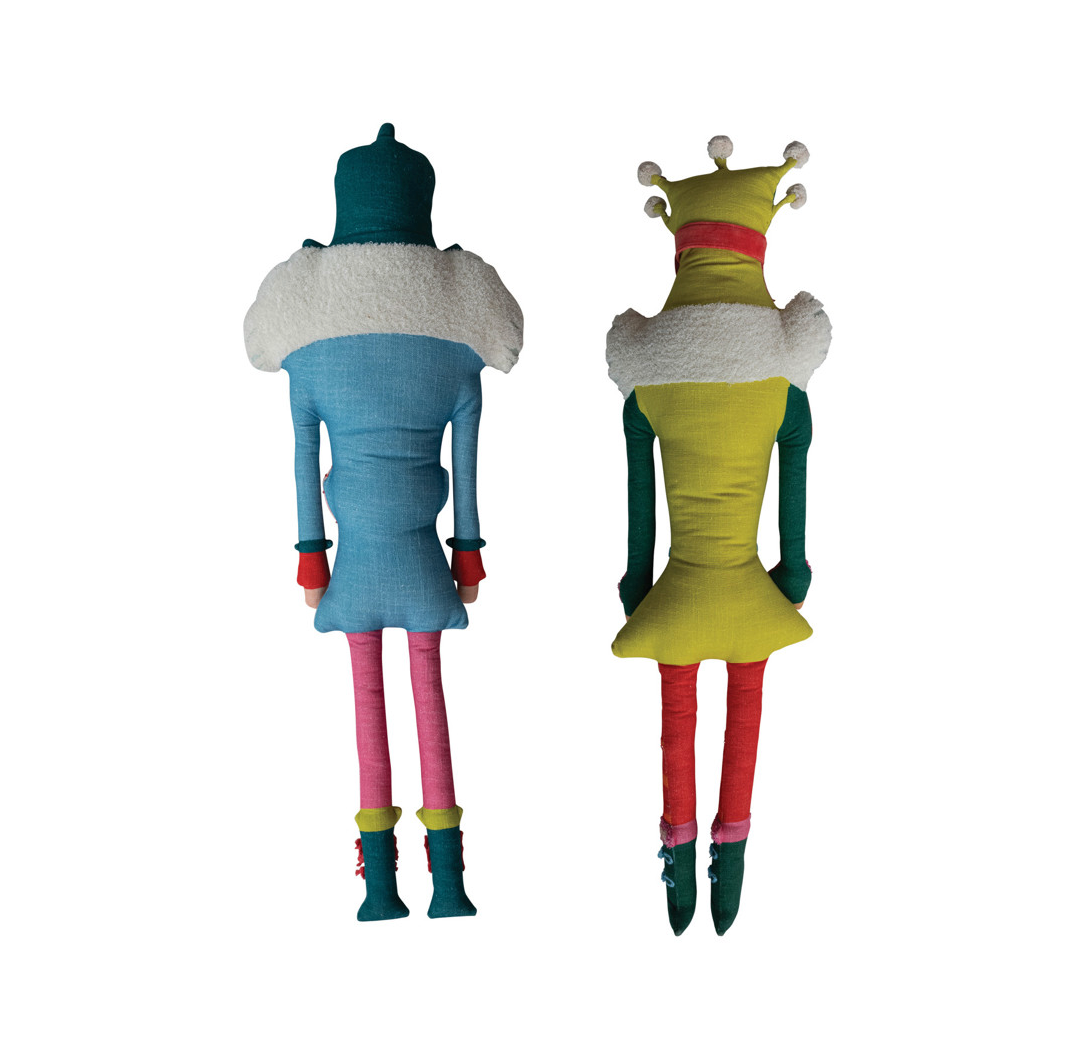 Nutcracker dolls figures shown from the back on a plain white background.  