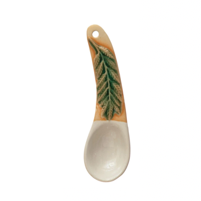 This artistically hand-painted stoneware spoon with a floral design handle will be a beautiful addition to any kitchen serving pieces. It is a functional and charming piece that will complement many kitchen collections and styles. Perfect for everyday use or entertaining family and friends in a casual setting. Each one will vary slightly.

Hand-Painted Spoon - Fern Leaf