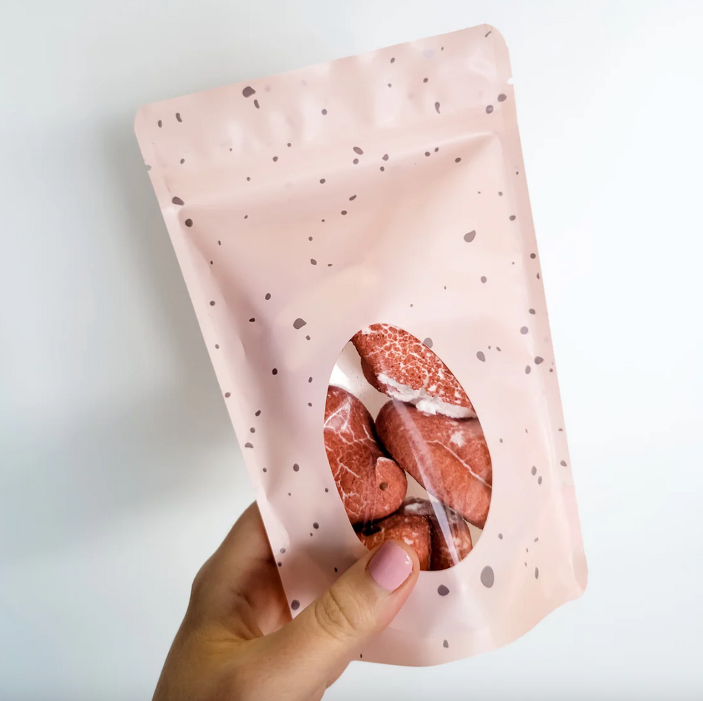 Dr. Pepper freeze dried peeps in a pink bag.